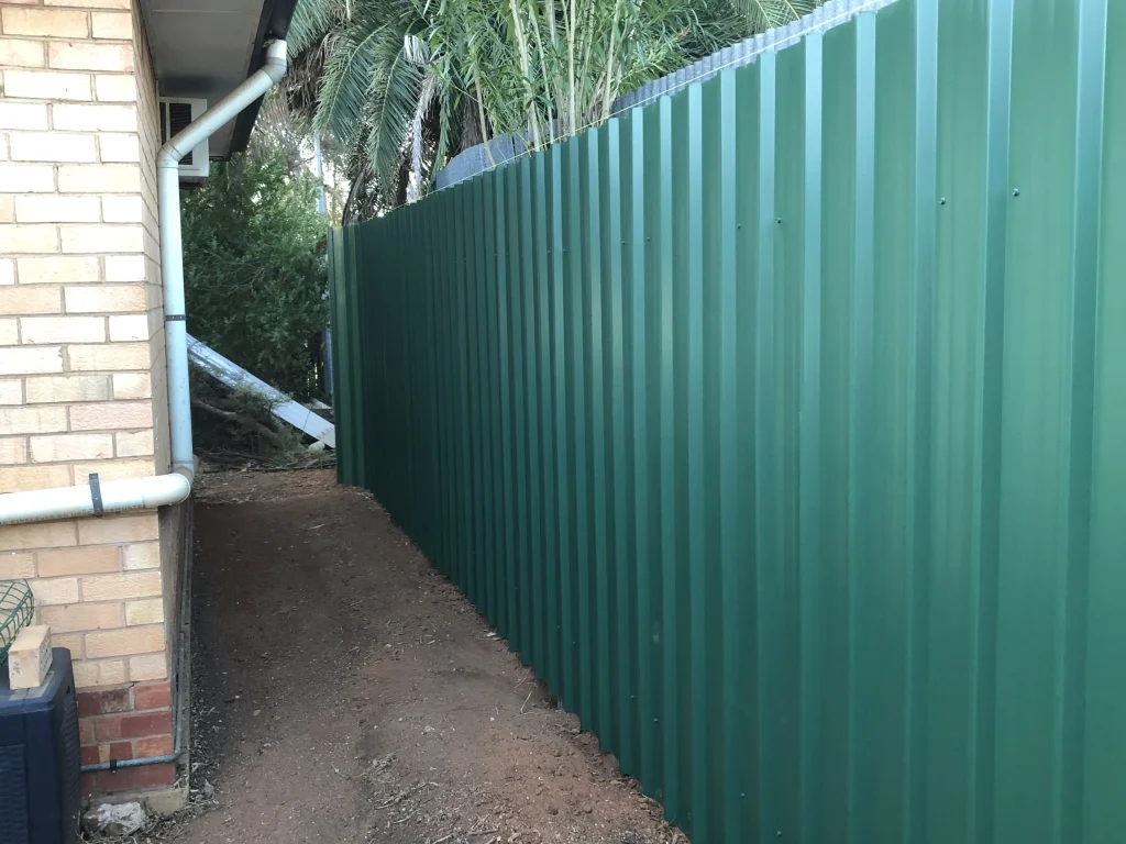Colorbond post and rail fence