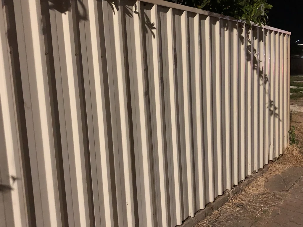 Colorbond post and rail fence, paperbark